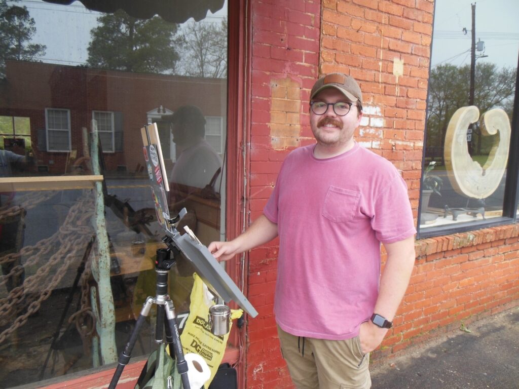 Matthew Peterson with easel