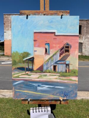 The Building in the Corner on easel by Lisa Swift