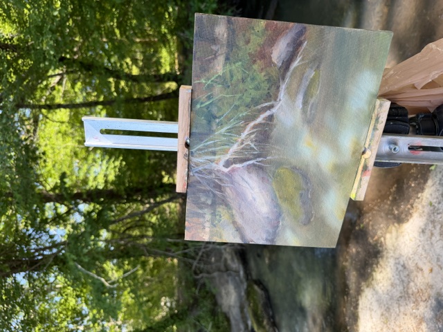 Sun Spots on the Water on easel by Lynett Fink