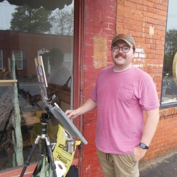 Matthew Peterson with easel